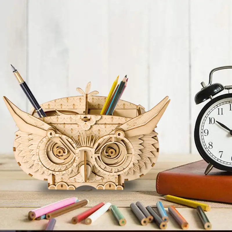 an owl clock and a pencil holder