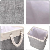 the gray and white fabric storage basket