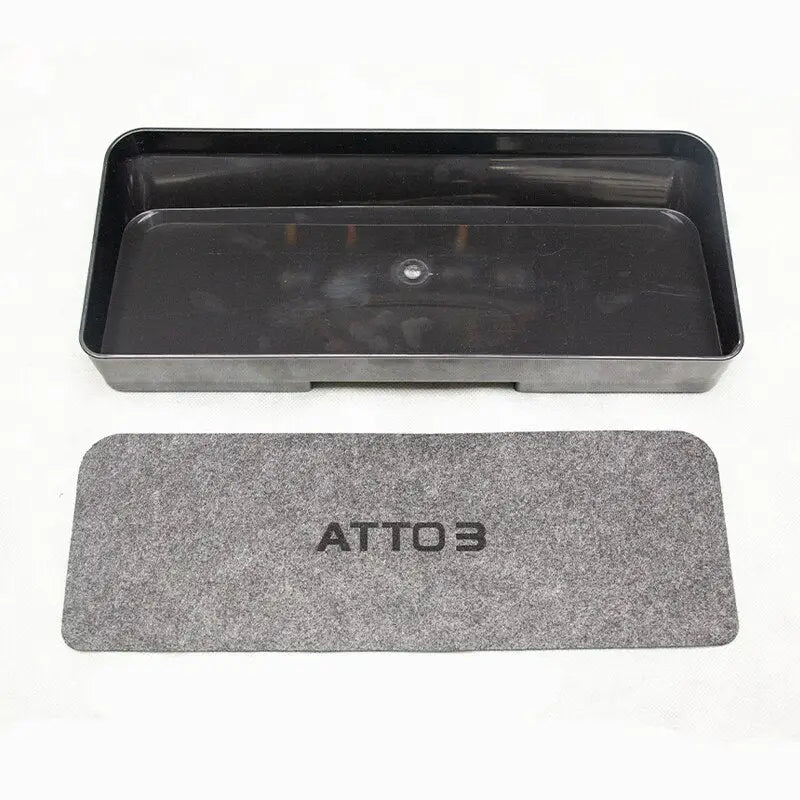 a metal tray with a black tray cover