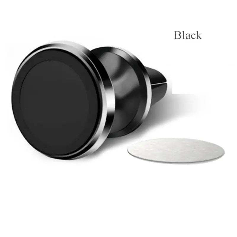 a close up of a black button with a white disc