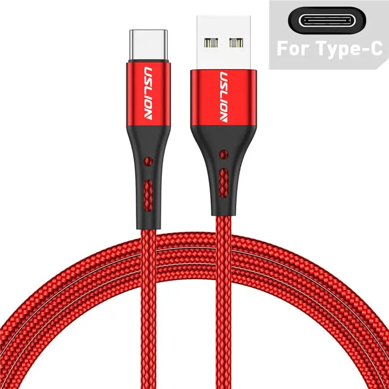 a close up of a red and black cable connected to a charger