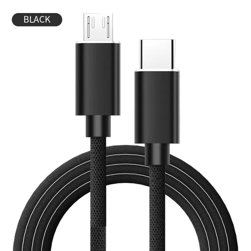 the black usb cable is connected to a usb cable