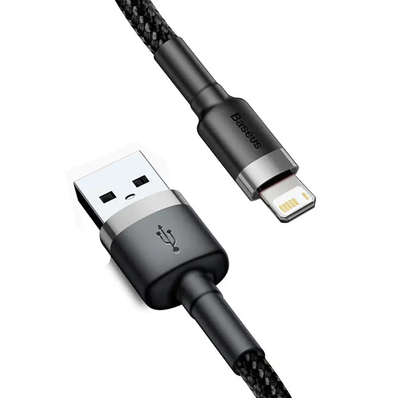 a close up of a black and silver usb cable connected to a phone