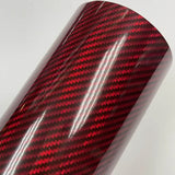 a close up of a red and black carbon fiber wrapper