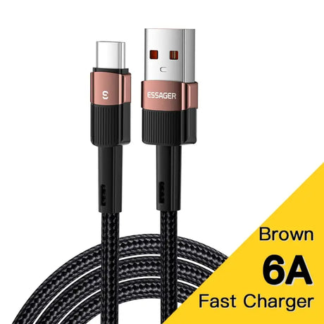 a close up of a black and gold charging cable with a white background