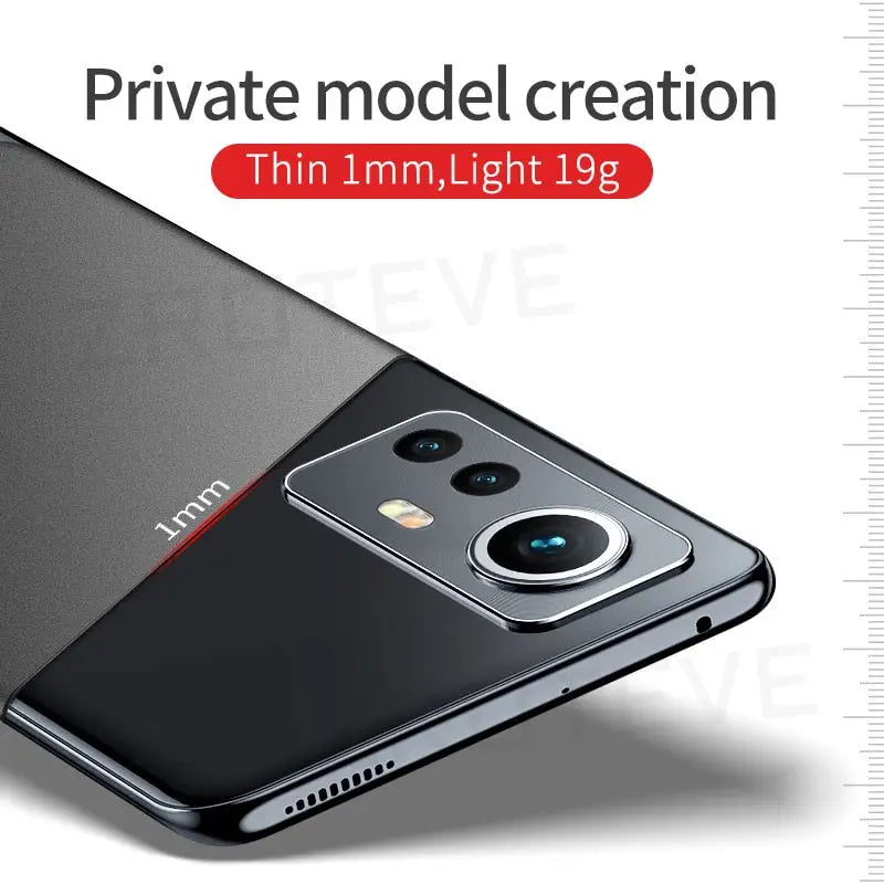 the back of a black phone with a red and white logo