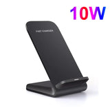 a close up of a black phone stand with a white background
