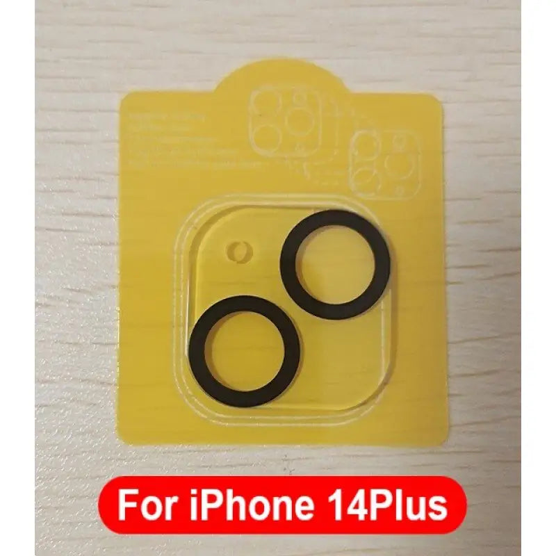a close up of two black rubber o - rings on a yellow package