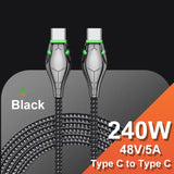 a close up of a black and silver cable connected to a charger