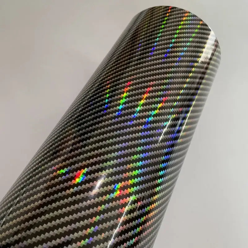 a close up of a black and silver carbon fiber