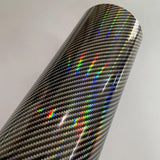 a close up of a black and silver carbon fiber