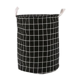 a black and white basket with a grid pattern