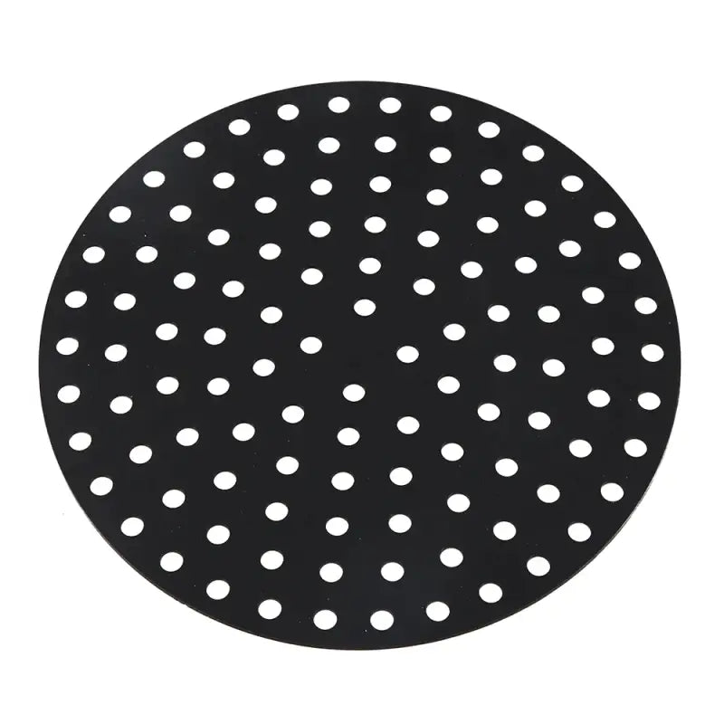 a close up of a black and white polka dot plate