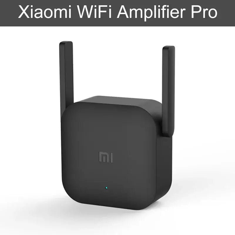 A close up of a black wifi amplifier with a white background