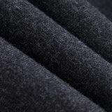a close up of a black wool fabric