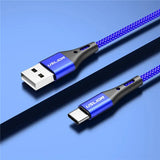 a close up of a blue and black cable connected to a phone