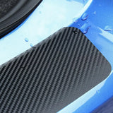 a close up of a blue car with a black seat pad