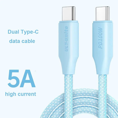 a close up of a blue cable connected to a white and black charger