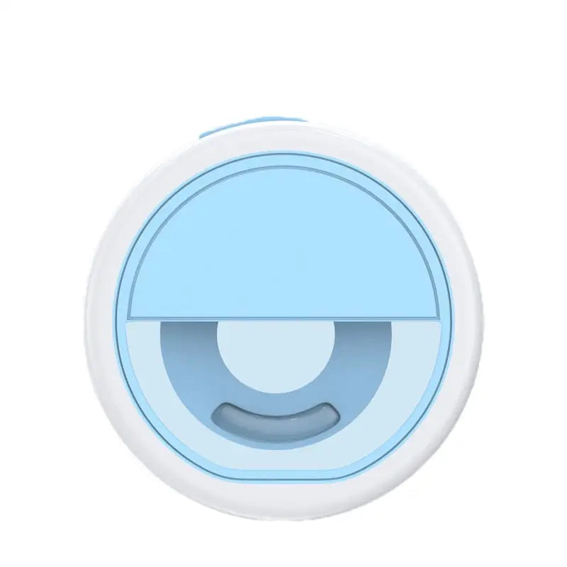 a blue and white button with a smiley face