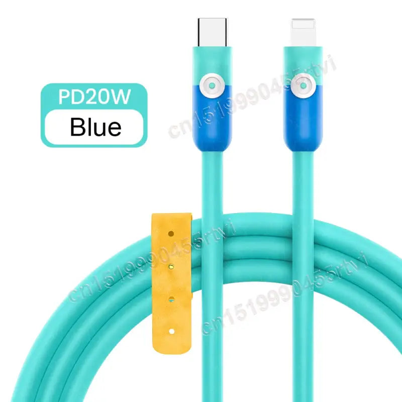 a close up of a blue and yellow usb cable connected to a yellow charger