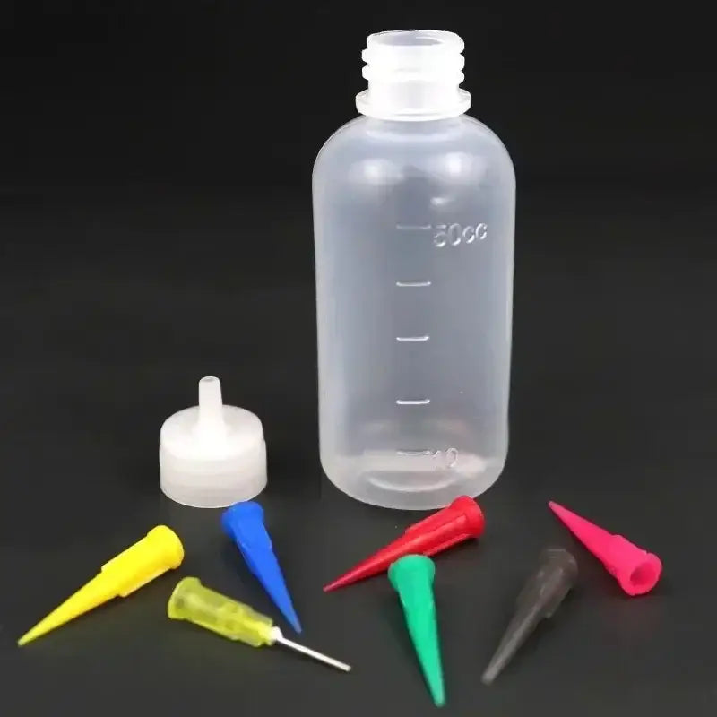 a close up of a bottle with a lot of different colored plastic items