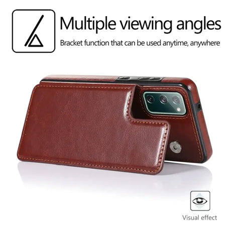 A close up of a brown leather case with a camera attached