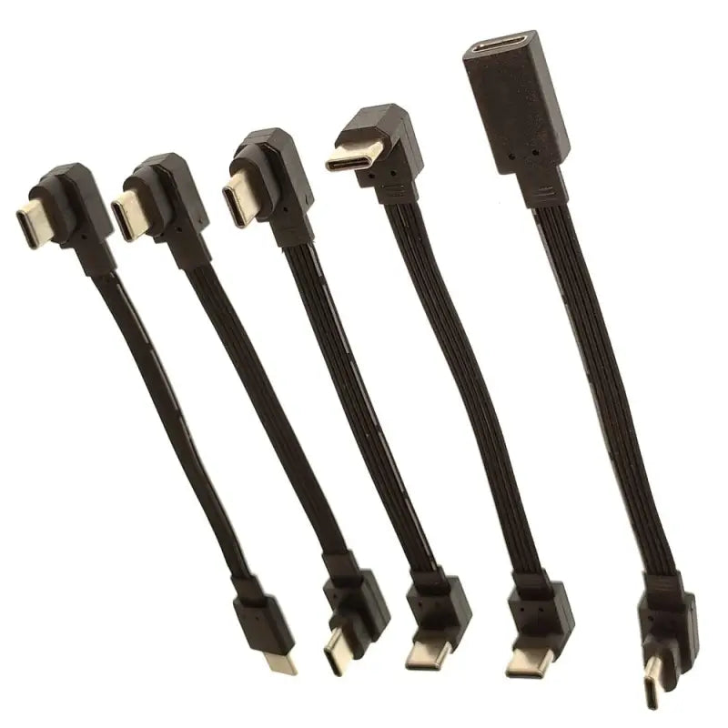 a set of four black metal connectors