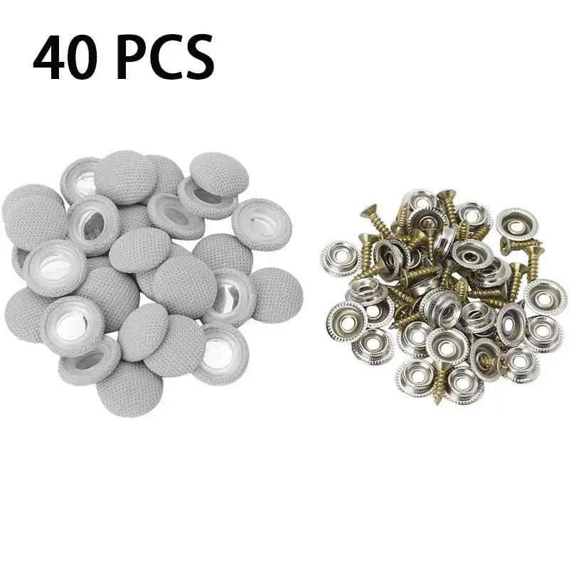 a close up of a bunch of screws and nuts on a white background