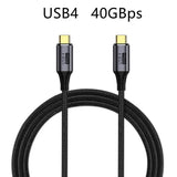 a close up of a usb cable with a black braid