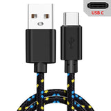a close up of a usb cable with a black and yellow braid