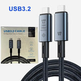 a close up of a usb cable with a box of cables