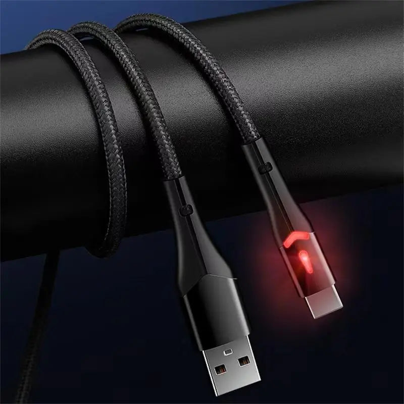 a close up of a usb cable connected to a red light