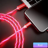 a red cable connected to a laptop