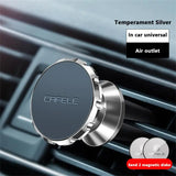 a close up of a car air vent with a logo on it