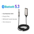 A close up of a car charger with a cord attached