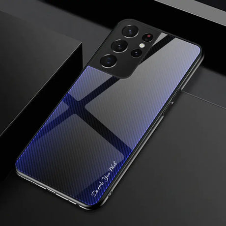 A close up of a cell phone with a blue carbon fiber case