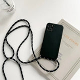 there is a black phone case with a black cord on it