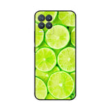 a close up of a lime slice phone case with a green background