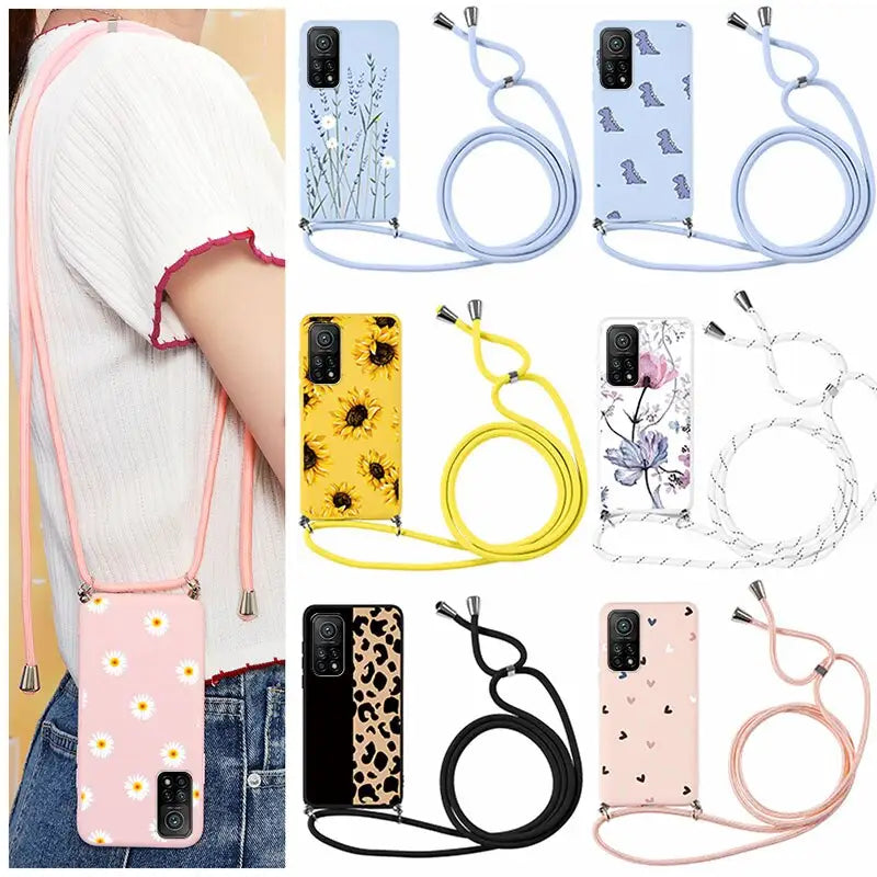 a woman holding a phone case with a phone strap