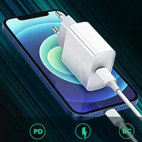 a close up of a cell phone with a charger attached to it