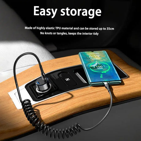 a close up of a cell phone charging station on a desk