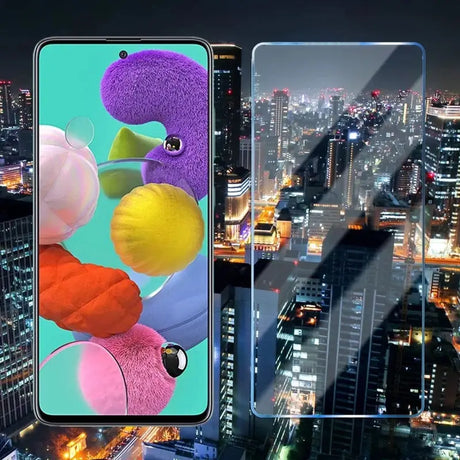 a close up of a cell phone with a city in the background