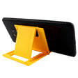 a close up of a cell phone holder with a yellow stand