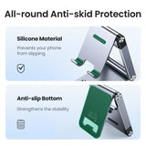 a close up of a cell phone holder with a green cover