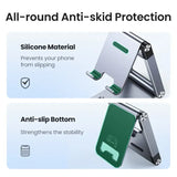 A close up of a cell phone holder with a green cover