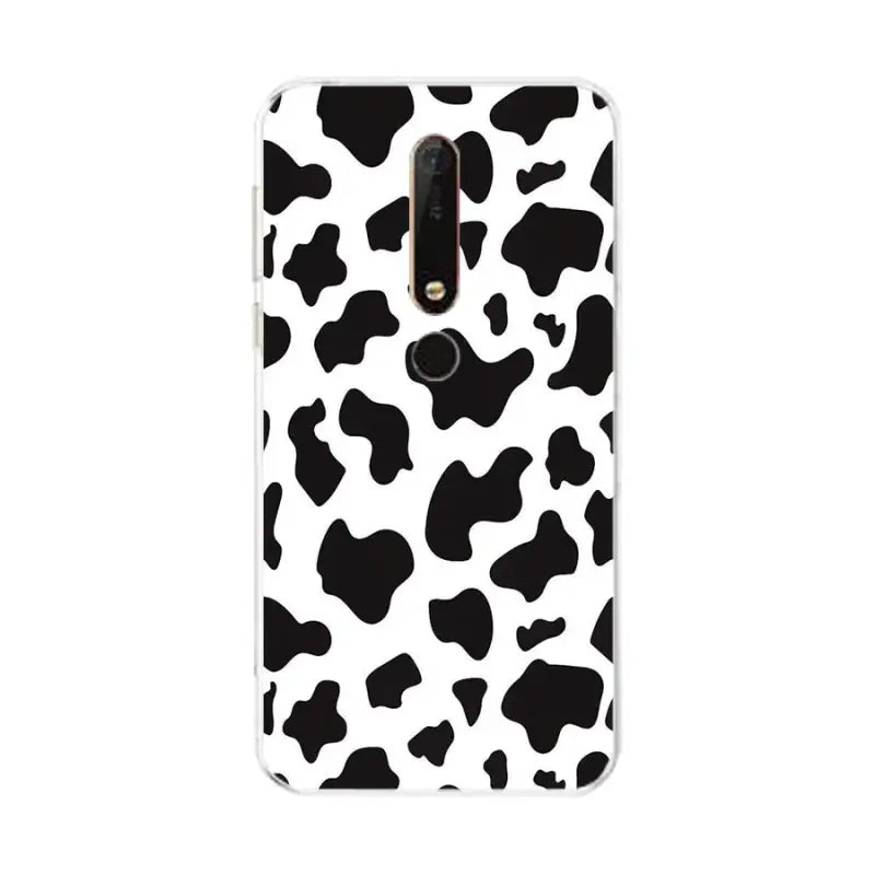 a black and white cow print phone case for the lg v40