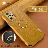 a close up of a cell phone with a ring holder
