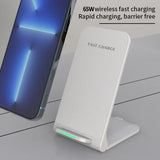 a white wireless charger with a blue light on top