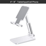 a white table top with a white phone holder