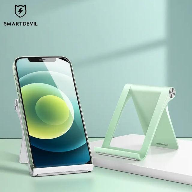 there is a smart phone that is sitting on a stand